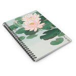 A stylish designed spiral notebook, featuring the beautiful image of Water Lilies, by Ohara Koson, 1920 - 1930). With a pale blue background, featuring pink water lilies and green lily pads on the front cover, and black on the back cover. Perfect for Shopping lists, school/ college/ University notes, personal notes, making notes of ideas, to do lists and general note taking. 118 pages, ruled line paper and durable cover. Width 1.5 cm, Length 15.2 cm, Height 20.3 cm