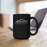 UFO Cave Painting 15 oz Mug. A black mug featuring an image of a UFO with two lines of orb balls underneath it.  The image is from a cave painting dating back thousands of years, depicting what experts believe is an ancient UFO sighting.   Design is printed in white, on both sides of the mug. www.ridethestyle.com